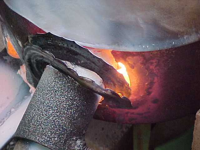 closeup of mag fire destroyed burner tube.jpg